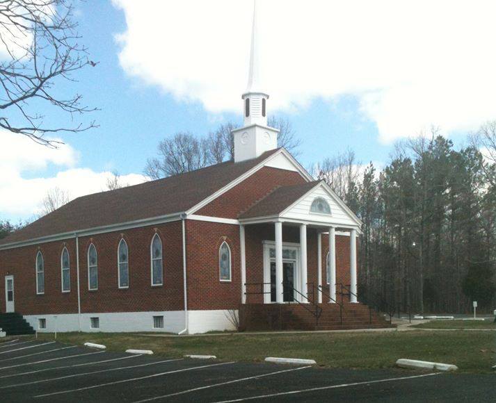 Historic brick church building with steeple in Springfield